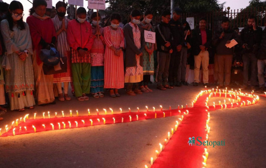 ३५ औं विश्व एड्स दिवसको पूर्वसन्ध्यामा दीप प्रज्वलन (तस्बिरहरू)